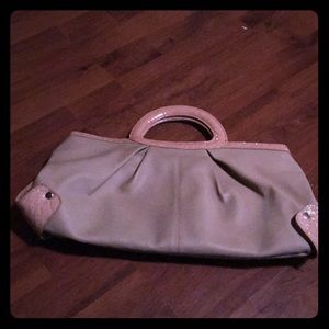 Lovely cream colored large clutch.